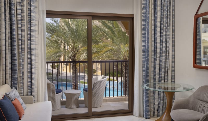 middle-east-holidays-ras-al-khaimah-doubletree-by-hilton-resort-spa-marjan-island-hotel-guest-room-with-pool-view